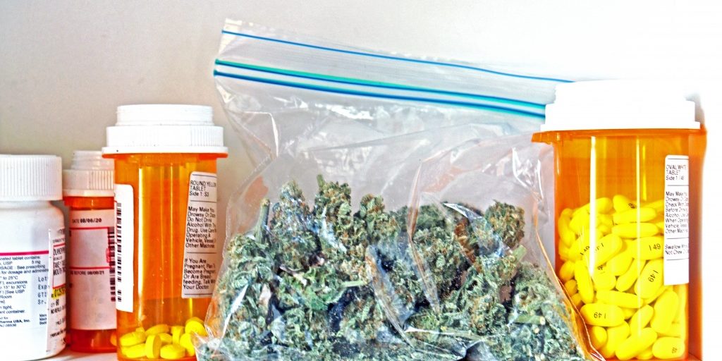 Bag of cannabis in medicine cabinet